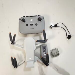 DJI Silver Drone with Controller and Accessories